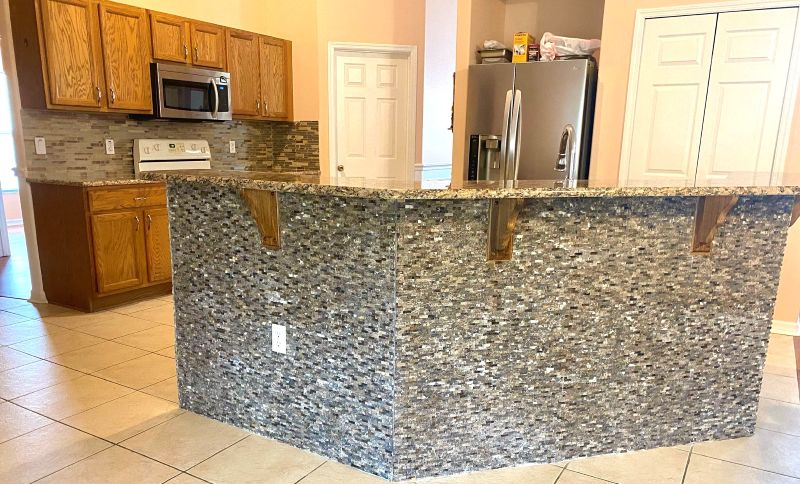 Kitchen · Stacked-stone island & granite counters
