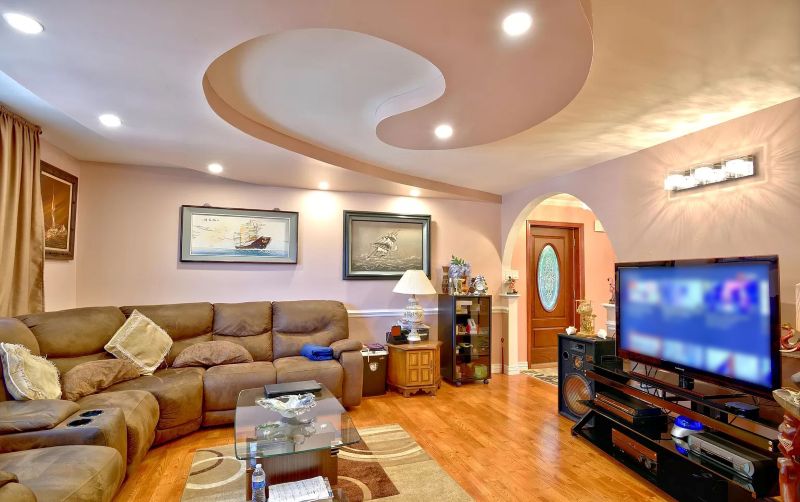 Living room · Sculpted ceiling & cove lighting